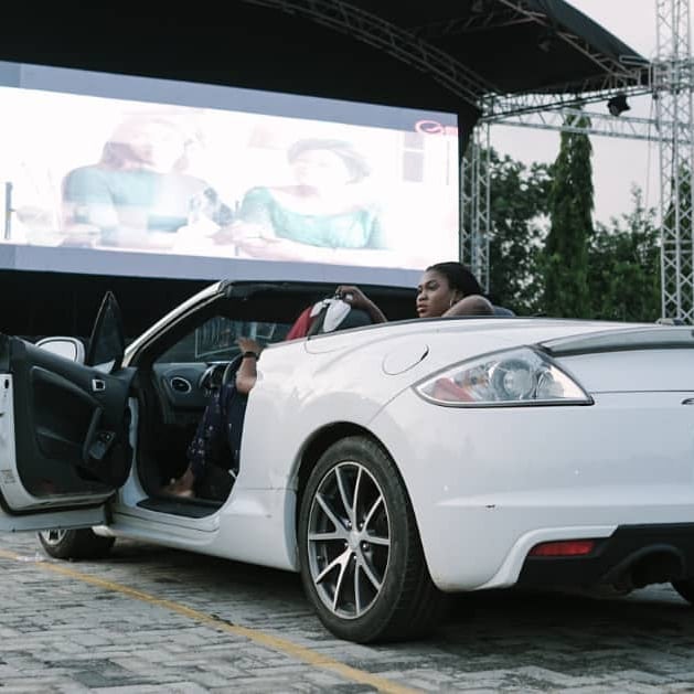 A family at a drive-in cinema