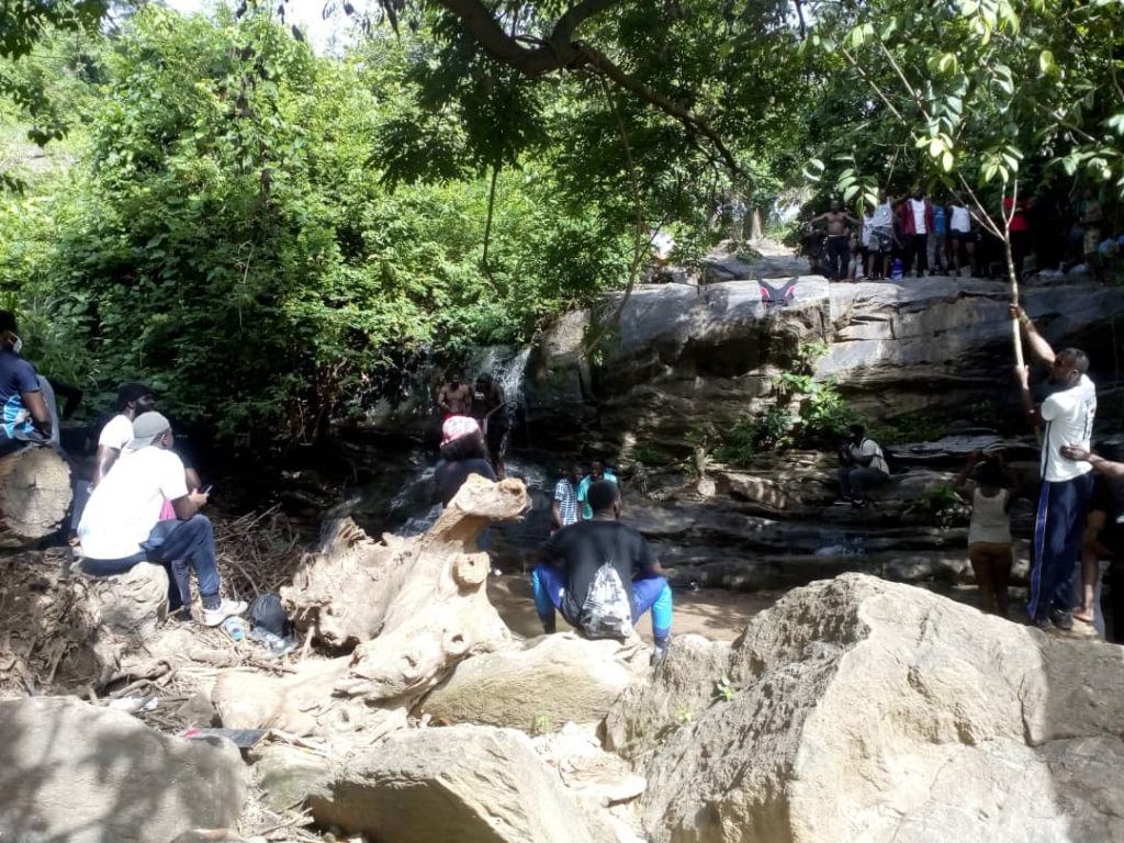 Hikers and picnickers at Karu Waterfall