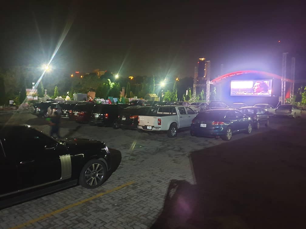 Movie viewing at an outdoor drive-in cinema